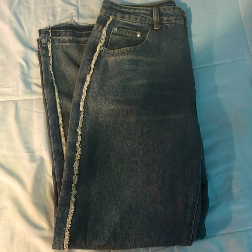Baggy denim jeans, up cycled, used.